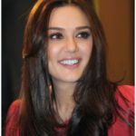Preity Zinta Comparing wearing jeas